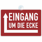 Hinweisschild Eingang um die Ecke