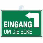 Hinweisschild Eingang um die Ecke